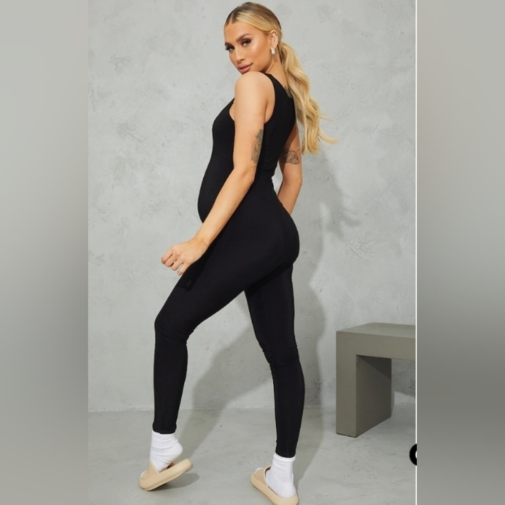 Maternity black one piece body con jumpsuit NWT. L size 10.